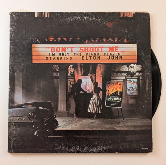 Elton John - 'Don't Shoot Me I'm Only The Piano Player'